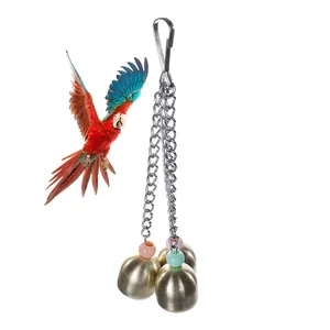 Detailed view of durable alloy birdcage bells featuring three hanging bells for parrots