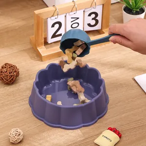 Grande gamelle en forme de fleur pour chiens et chats avec pelle à nourriture.