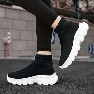 Baskets chaussettes noires en maille avec semelle blanche épaisse
