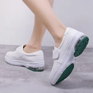 Professional white nurse shoes with rocker sole and visible air cushion for women