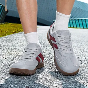 Retro grey GAT sneakers with red stripes and breathable mesh for men and women