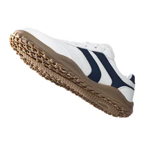 Classic retro GAT style sneakers featuring white upper with navy stripes and gum rubber sole