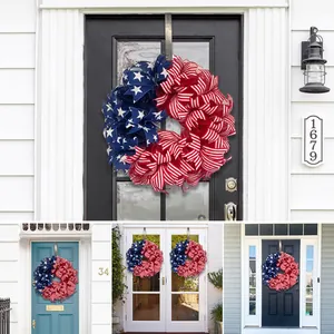 Detailed view of patriotic American flag wreath hanging on various home front doors for holidays.