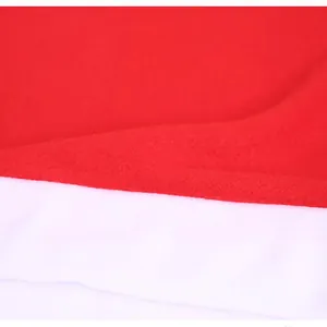 Close-up macro view showing soft red and white felt texture of Christmas chair cover