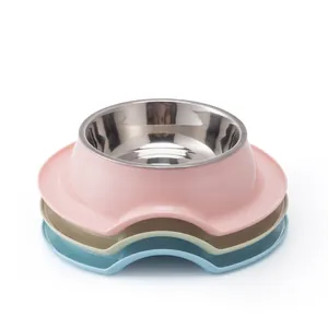 Stackable non-slip stainless steel pet bowls in pink, beige, and blue colors.