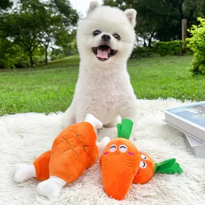 Squeaky plush carrot and chicken leg toys for dogs and cats on a cozy white rug