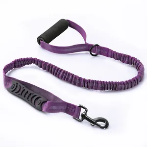Durable purple elastic dog leash with double handles and reflective stitching details