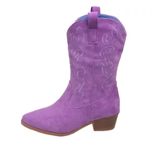 Detailed side view of purple suede western cowboy boot with elegant embroidery and chunky heel.
