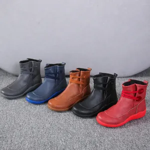 Selection of British style women's Martin boots in five vibrant colors displayed in a row
