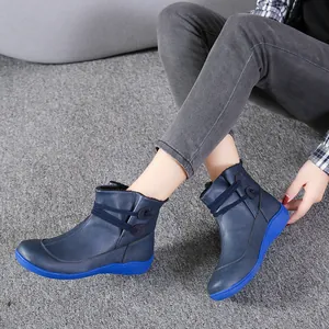 Blue women's Martin ankle boots with comfortable sole and elastic strap detail