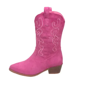 Side detail of vibrant pink embroidered women's western cowboy boots with pointed toe