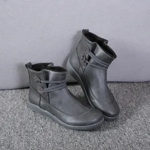 Classic grey women's Martin boots featuring plush lining and elastic cord detail