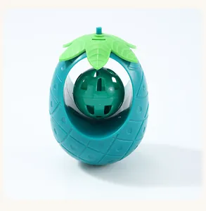 Detailed view of the pineapple tumbler cat toy with built-in catnip ball