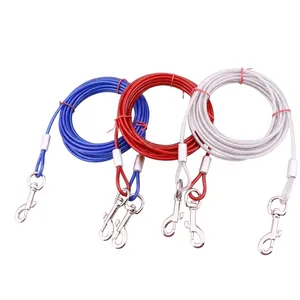 Durable steel wire pet tie-out cables for dogs in red, blue, and white with clips.