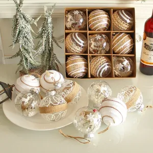 Juego de 9 bolas de Navidad decorativas en caja de regalo con diversos adornos festivos.