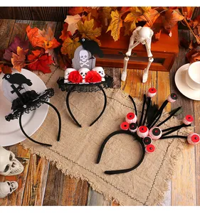 Detailed view of Halloween headbands featuring bloodshot eyes and spooky tombstones.