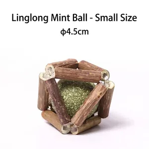 Detailed view of small catnip ball toy inside a silvervine wooden cage, 4.5cm diameter