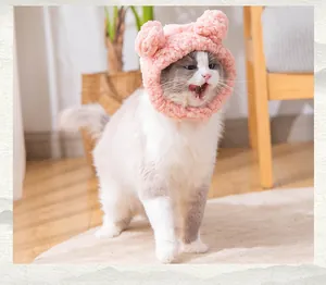 Cute pink plush bear ear hat for cats and small dogs, soft pet headgear detail