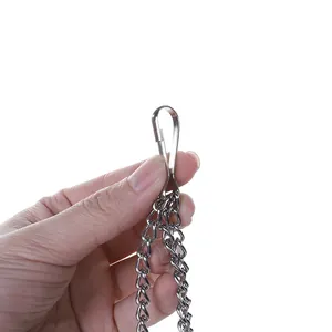 Detailed close-up of a durable metal hook and chain accessory for parrot bird cage toys