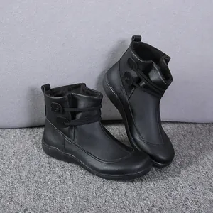 Women's black British style ankle work boots featuring warm fleece lining and decorative side straps