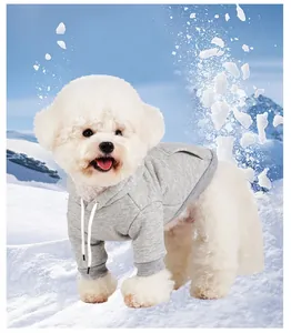 Grey fleece-lined hooded pet sweatshirt for small dogs in a winter snow scene