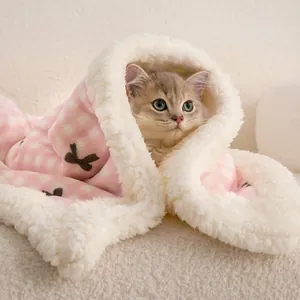 Cozy pink checkered pet blanket with soft fleece lining, perfect for small cats or dogs.