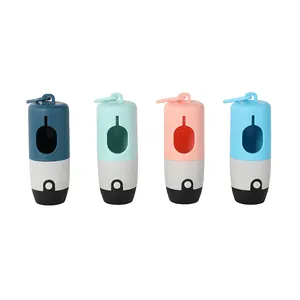 Detail showing four colors of portable dog waste bag dispensers with integrated LED light