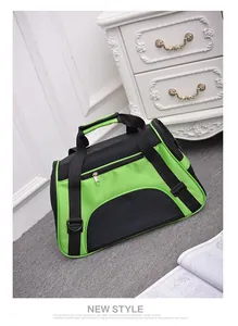 Green and black portable pet carrier with breathable mesh for cat and dog travel