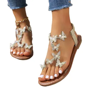 Stijlvolle dames sandalen met vlinder strass-steentjes en zachte platte zolen