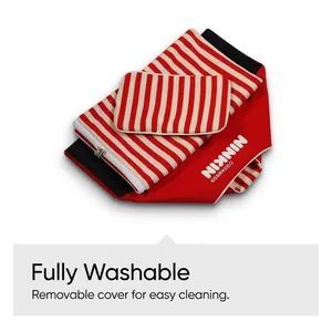 Macro view of red striped canvas pet bed cover with removable zipper for easy washing.