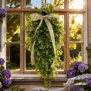 Lush artificial green leaf teardrop wreath swag with rustic burlap bow for door