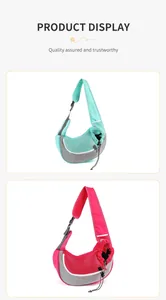 Borsa a tracolla traspirante per animali domestici in verde menthe e rosa intenso.