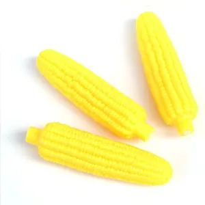 Set of three yellow vinyl squeaky corn dog toys for puppy dental cleaning and interactive play