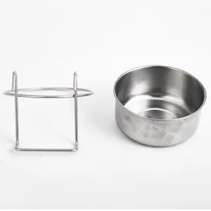 Durable stainless steel dog bowl with elevated metal wire stand on white background