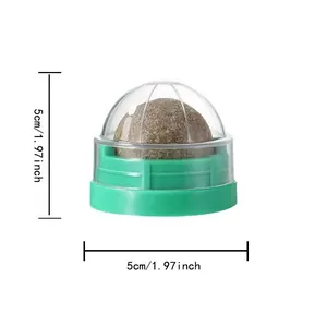 Rotating catnip ball toy for cats featuring a green base and clear cover, size 5cm