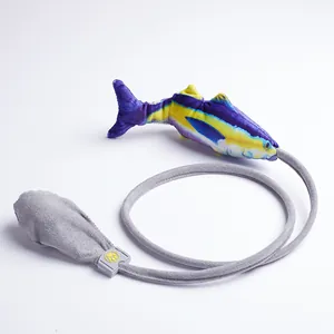 Interactive plush fish cat toy featuring a manual air bag squeeze pump for pet play