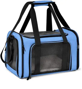 Side view of blue breathable pet carrier bag with black mesh windows and straps