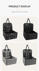 Foldable pet car seat carrier bag available in black and gray with paw print pattern.