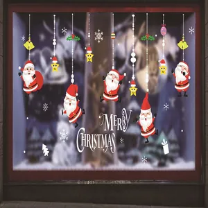 Detalle de las pegatinas estáticas vibrantes de Papá Noel y copos para ventanas
