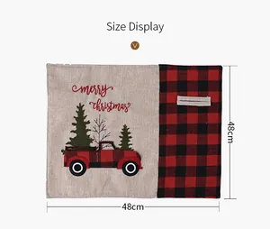 Detailed view of Christmas placemat showing 48x48cm size with festive car embroidery.