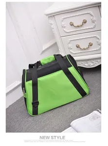 Portable green pet carrier with breathable mesh for cats and small dogs travel