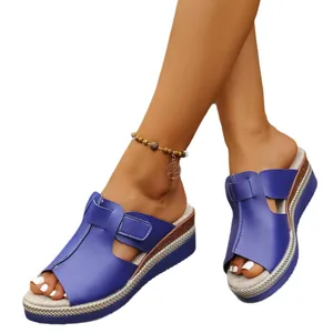 Women's blue peep-toe wedge sandals featuring thick platform and rope-braid sole