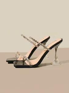 Elegante schwarze Damensandalen mit Strassriemen und kristallklaren Absätzen für Frauen
