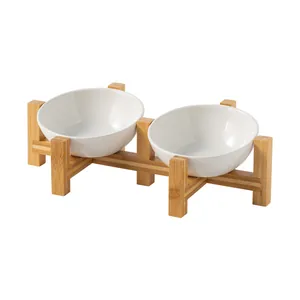 Elevated ceramic pet double bowl set with a sturdy bamboo stand for cats and small dogs