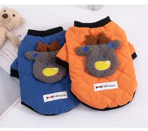 Warm winter quilted pet vests in blue and orange featuring adorable plush reindeer patches