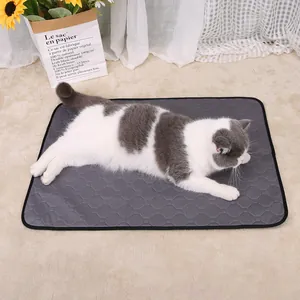 Detail of absorbent and washable gray pet mat featuring a durable quilted design