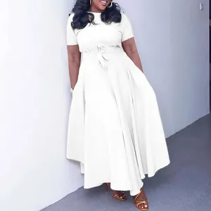 Elegant plus size white maxi dress with short sleeves and waist tie detail, shown in detail