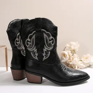 Retro black mid-calf Western cowboy boots featuring white embroidery and a chunky heel design