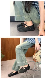 Detailansicht schwarzer atmungsaktiver Mesh Mary Jane Sneaker mit gekreuzten Riemen