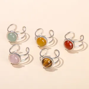 Set of five adjustable stainless steel rings with colorful natural stones for stylish women.